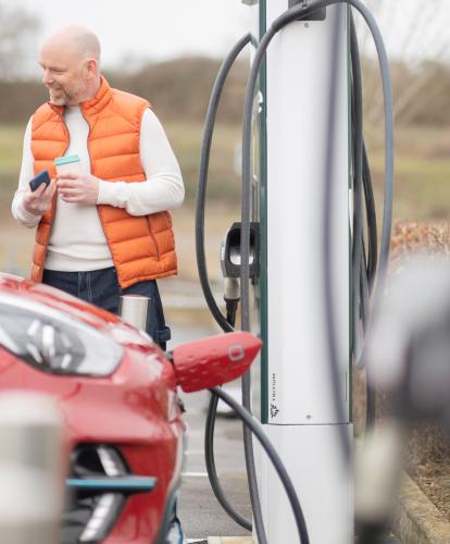 Couple charging at evyve charger